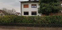 a house with a fence in front of it