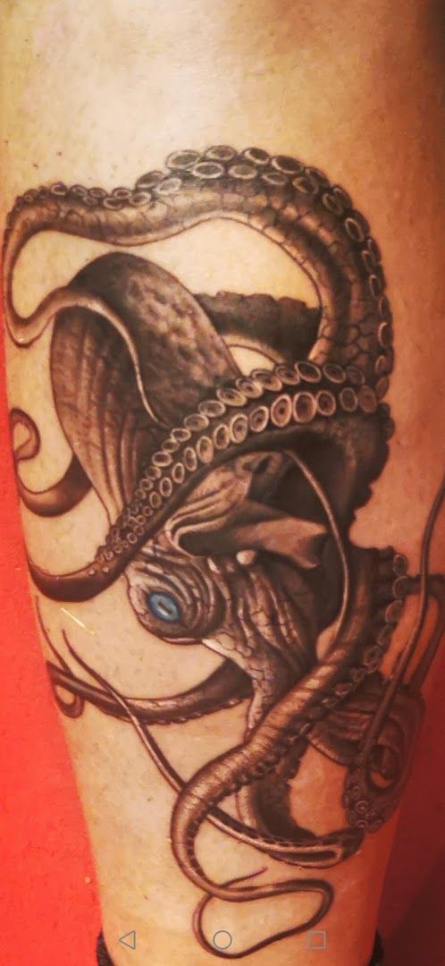 octopus cover-up tattoo on leg, bochum, germany