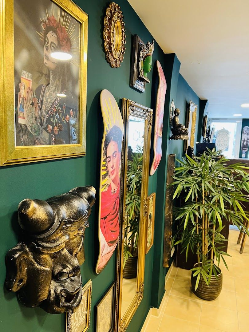a wall with pictures and pictures on it