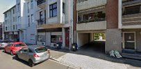 the street in front of the apartment building