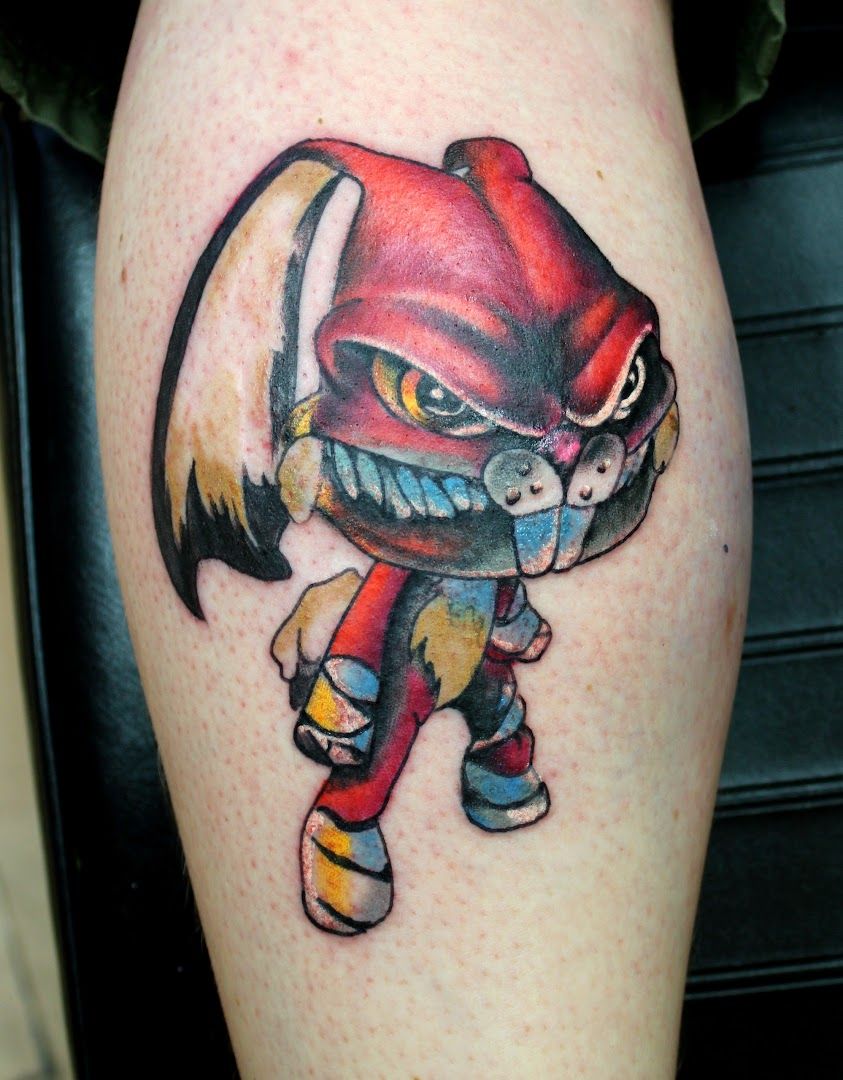 a narben tattoo of a cartoon character with a red and yellow outfit, bochum, germany