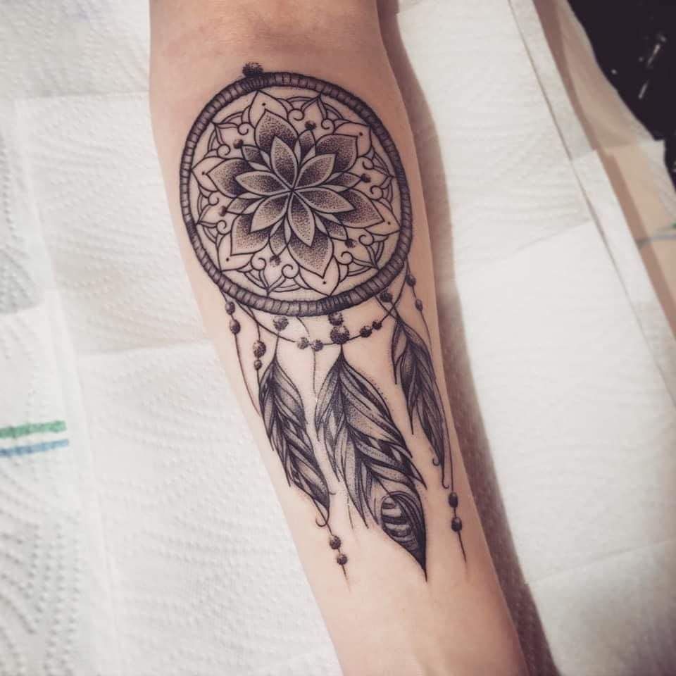 a narben tattoo with a flower and a dream catcher, saale-orla-kreis, germany