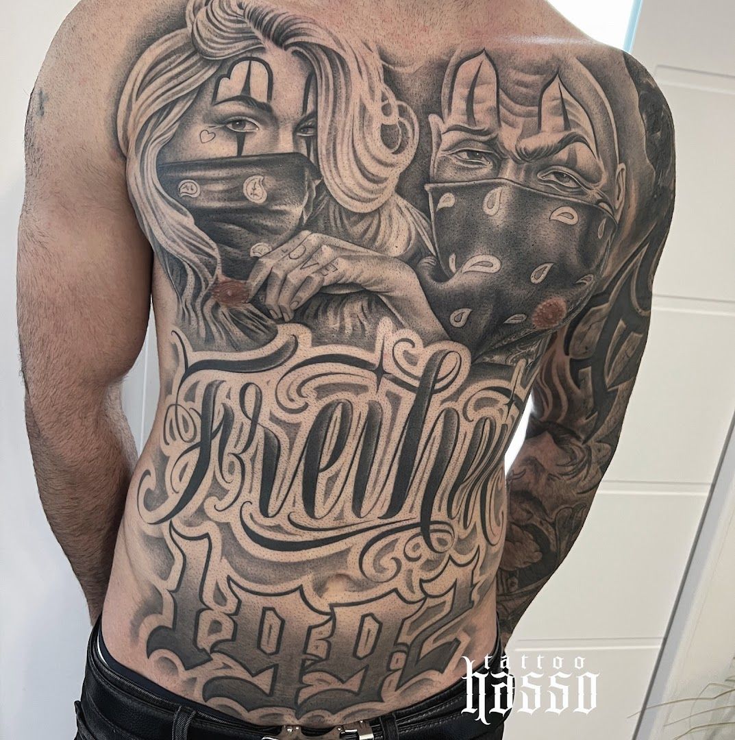 a man with a cover-up tattoo on his back, berlin, germany