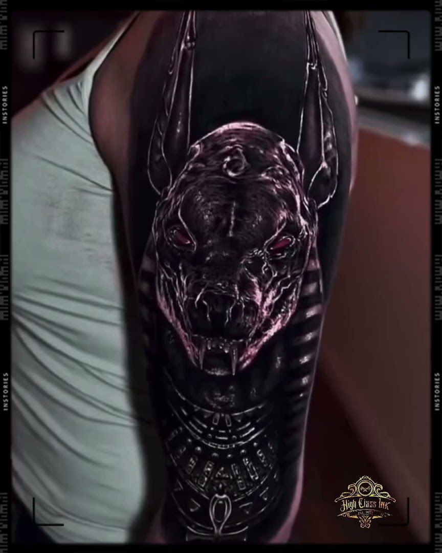 a man with a black panther portrait tattoos on his arm, wesel, germany