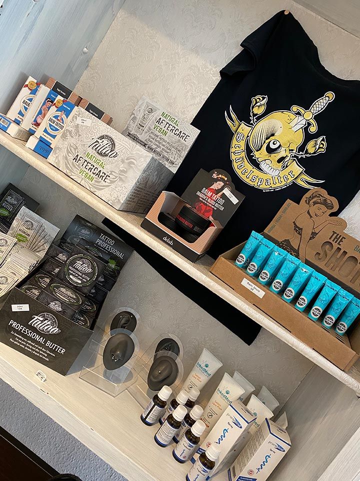 a shelf with various items and a t - shirt