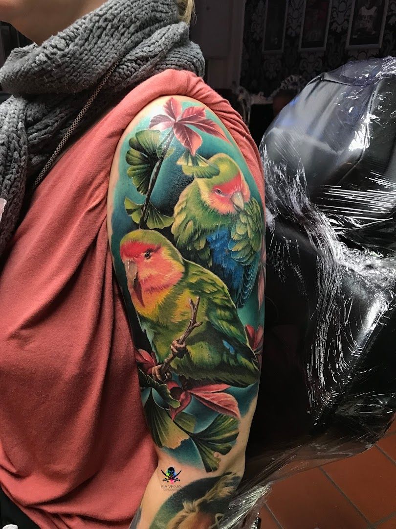 a woman with a colorful japanische tattoos in leipzig on her arm, minden-lübbecke, germany