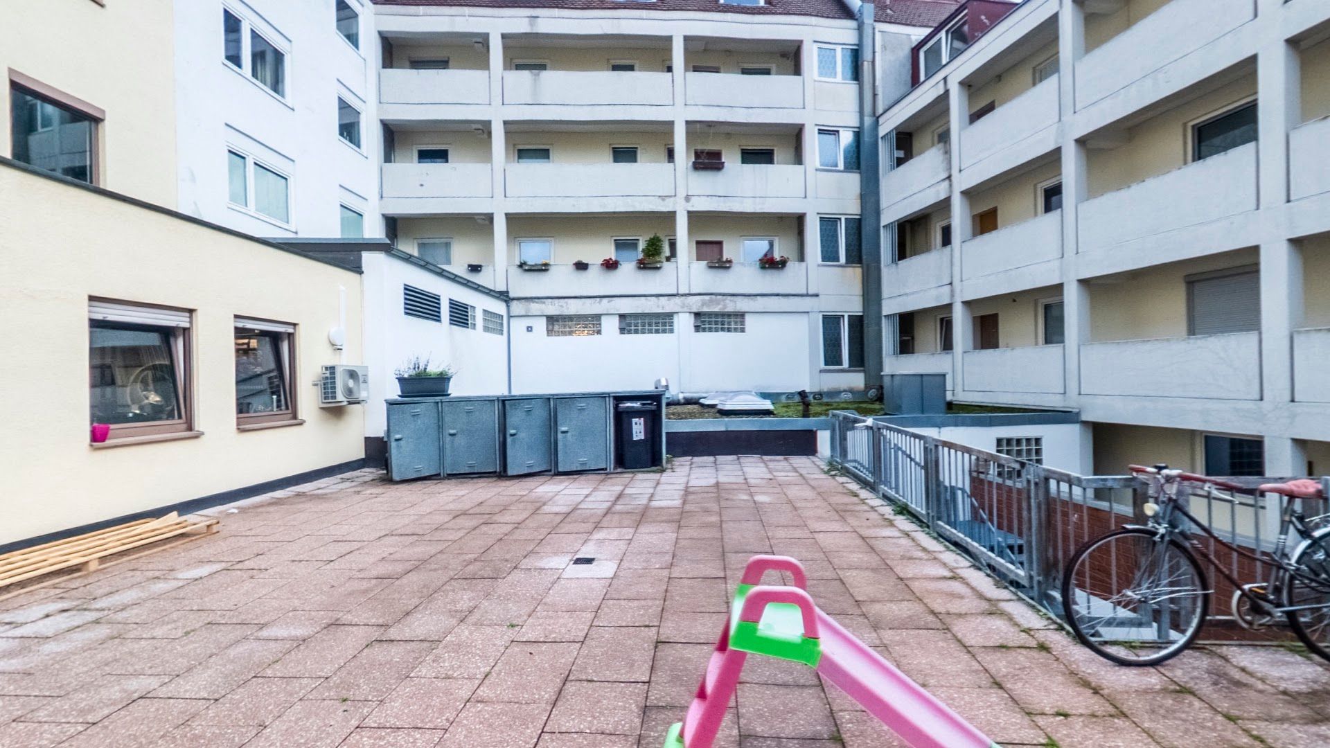 a bike parked in front of a building