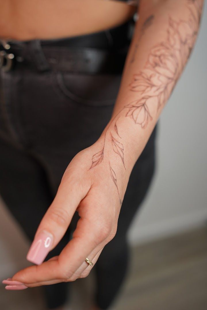 a woman with a narben tattoo on her hand, berlin, germany