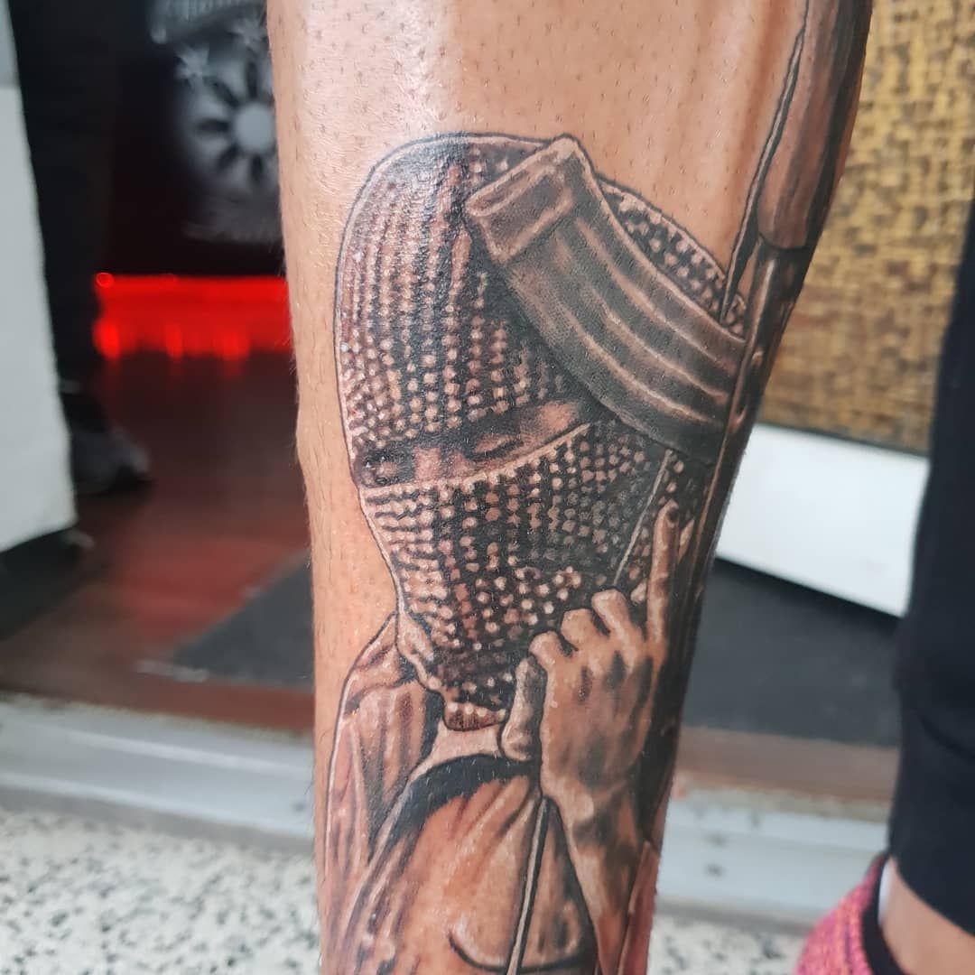 a cover-up tattoo of a man holding a microphone, herford, germany