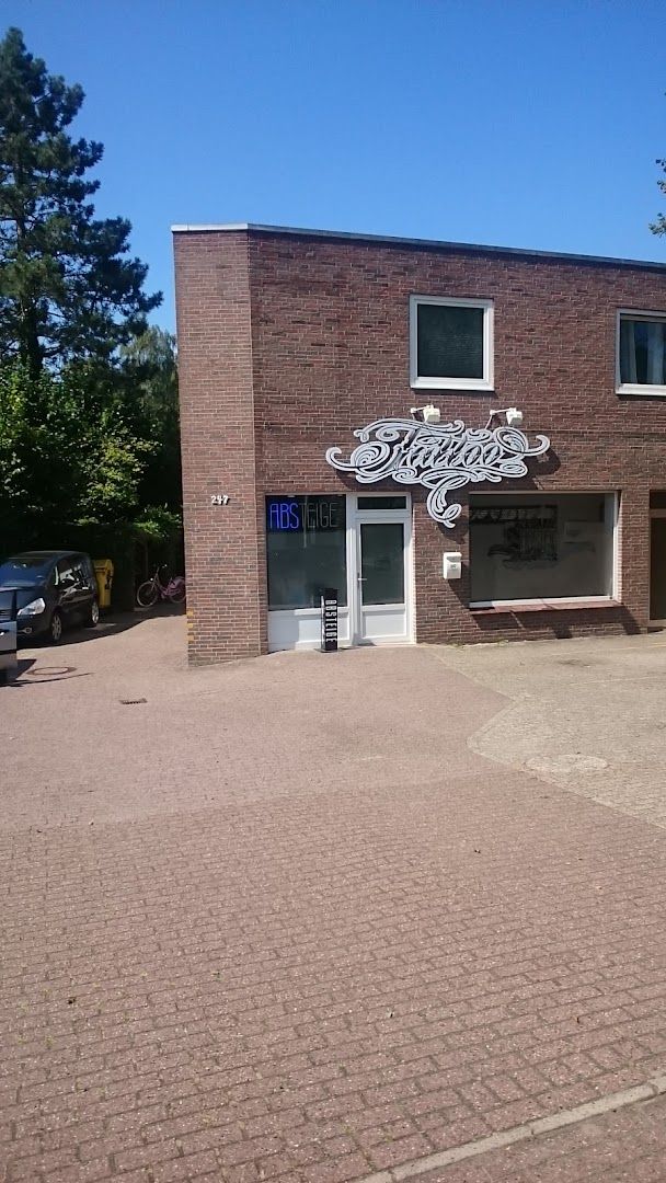 a brick building with a sign on the front