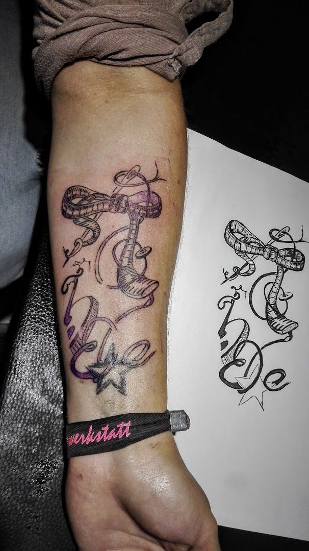 a narben tattoo of a snake and a snake on the wrist, neumarkt, germany