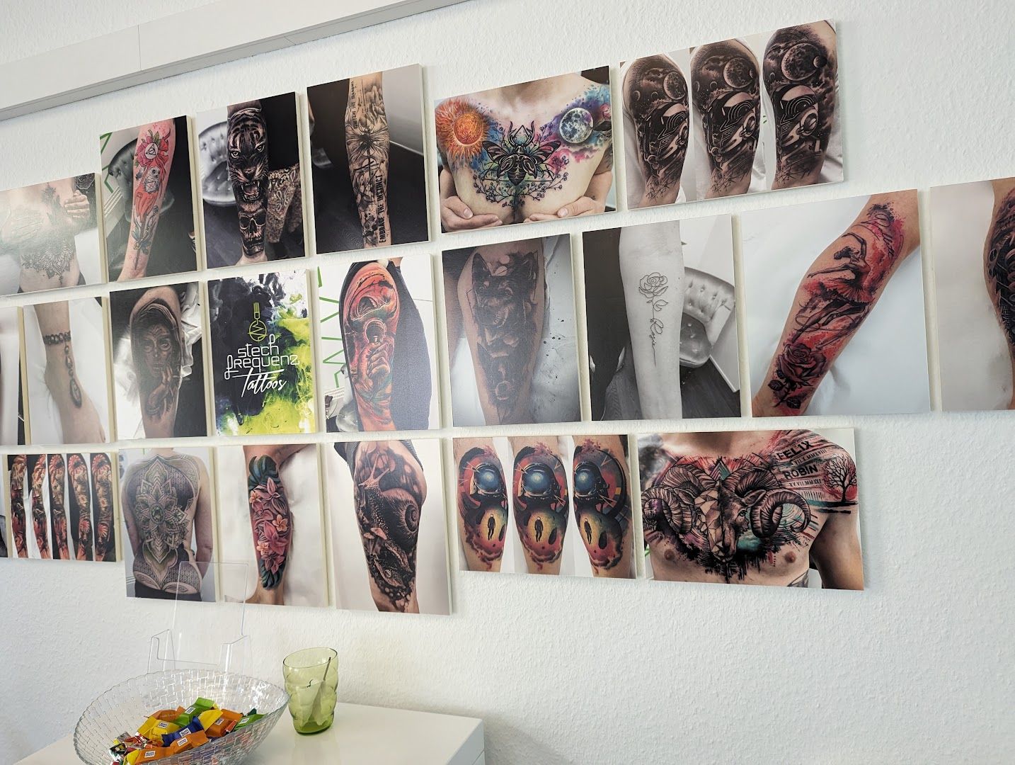 a wall with many narben tattoos on it, esslingen, germany
