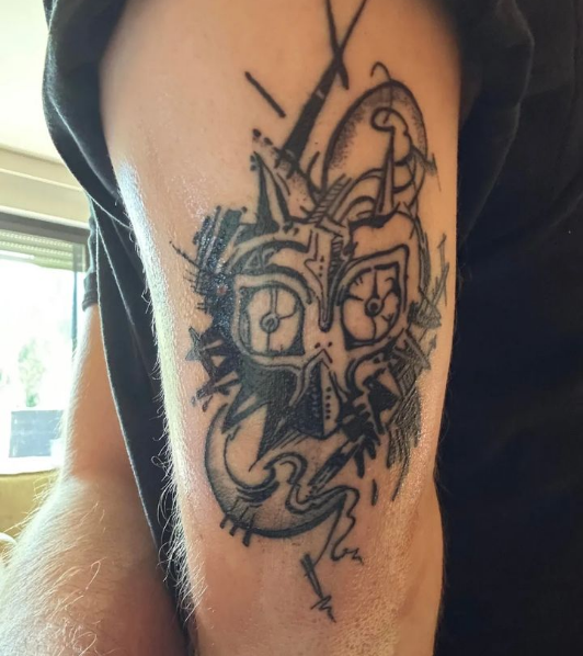 a narben tattoo of a man's face with a clock on his arm, neunkirchen, germany