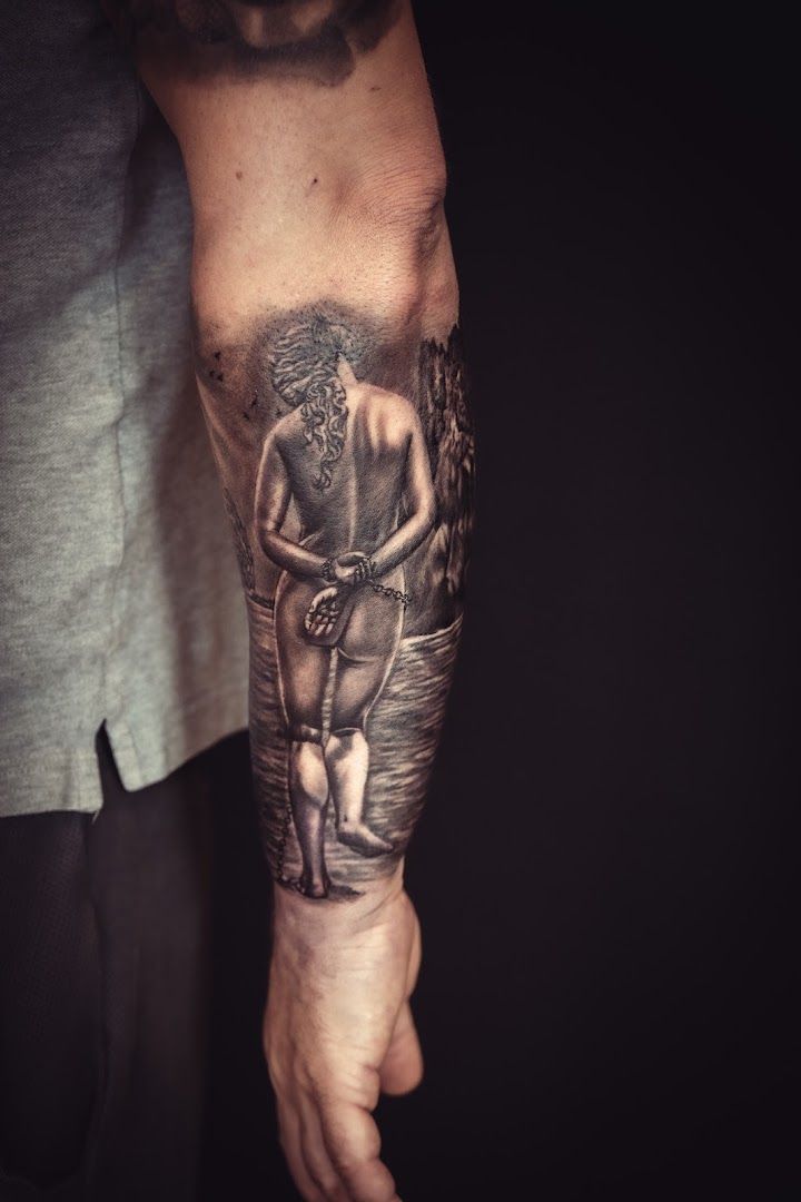 a man with a cover-up tattoo on his arm, bad kreuznach, germany