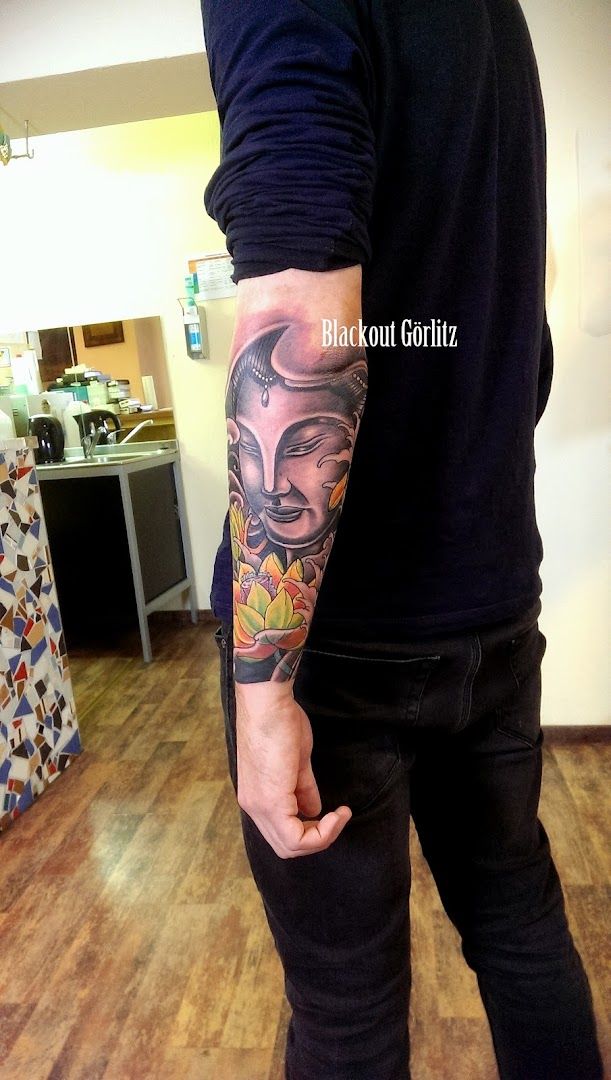 a man with a cover-up tattoo on his arm, görlitz, germany