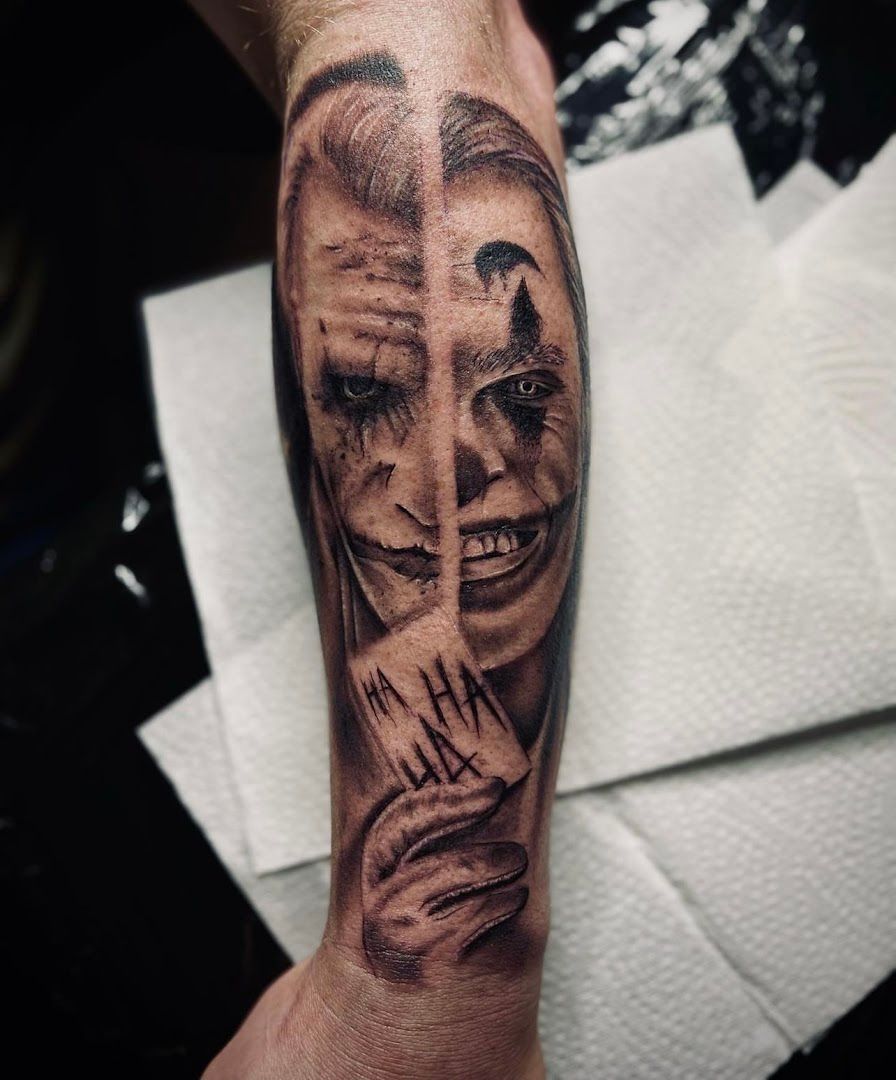 a cover-up tattoo of a joker with a face and a knife, duisburg, germany