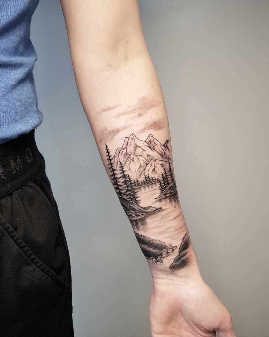 a mountain narben tattoo on the wrist, harburg, germany