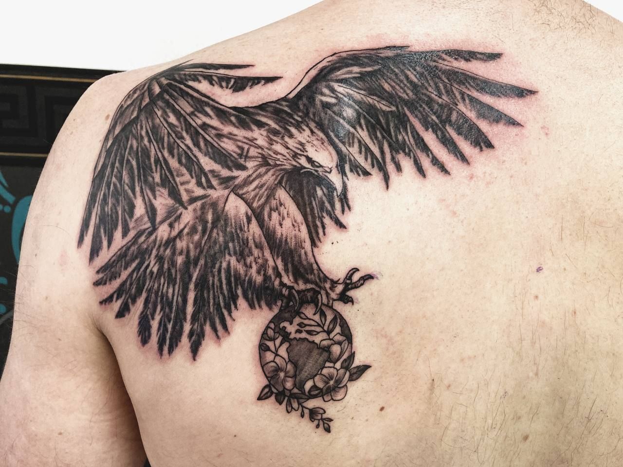 a man with a narben tattoo on his back, ostallgäu, germany