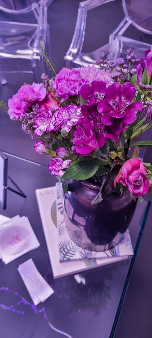 a vase of flowers on a table