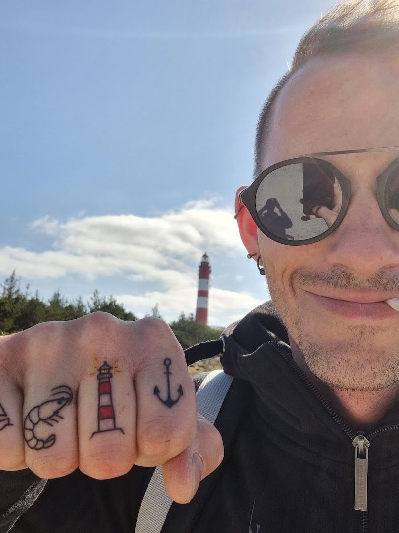 a man with a narben tattoo on his finger, nordfriesland, germany