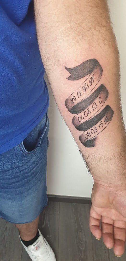 a man with a cover-up tattoo on his arm, gütersloh, germany