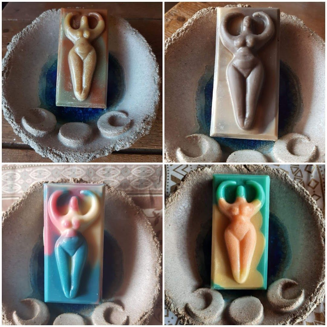 four soaps with different shapes and colors