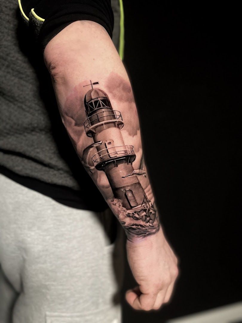 lighthouse cover-up tattoo on the arm, pinneberg, germany