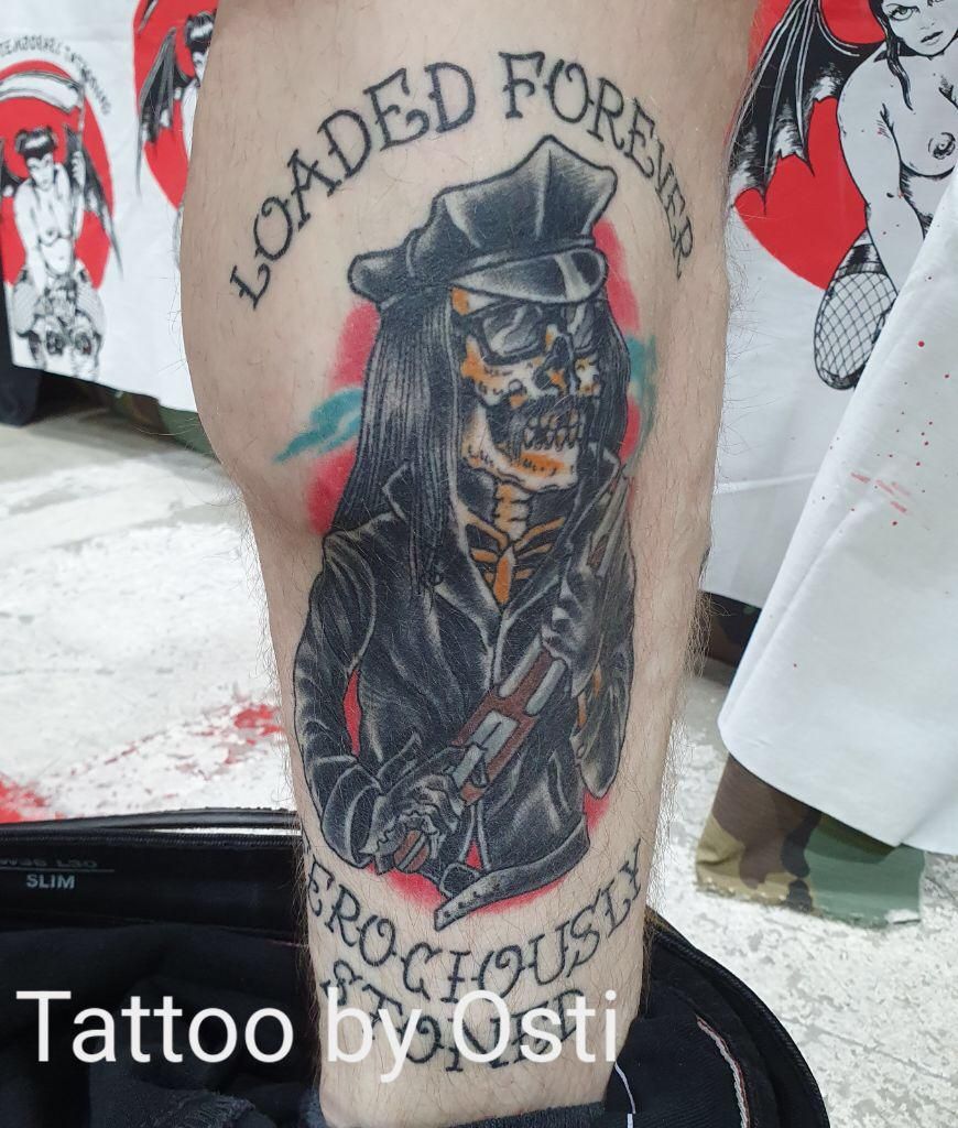 a japanische tattoos in leipzig of a man with a hat and a gun, forchheim, germany