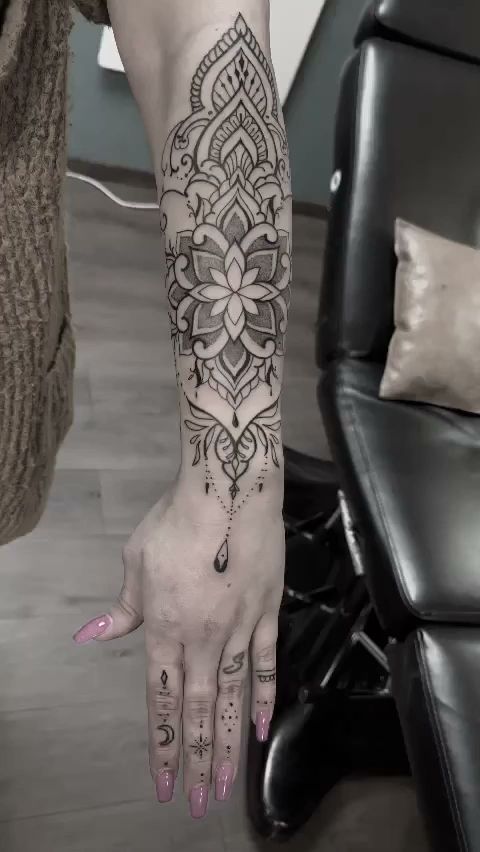 a woman's hand with a blackwork tattoo on it, mönchengladbach, germany