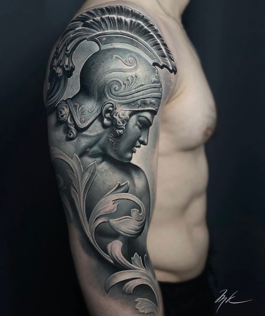 a black and white cover-up tattoo of a woman with a headdre, wetteraukreis, germany