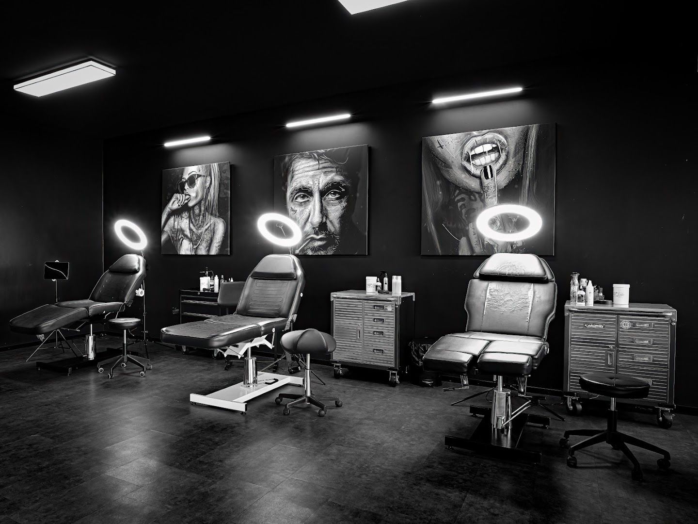 a salon with chairs and lights on the wall