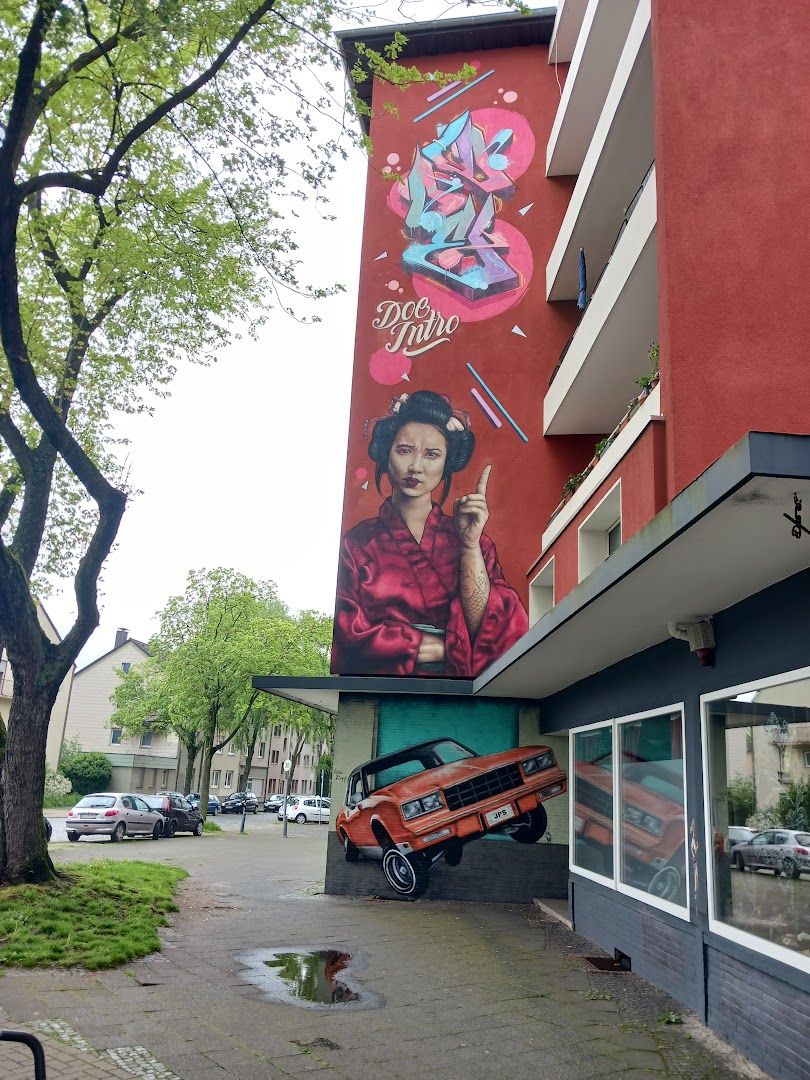 a car parked in front of a building