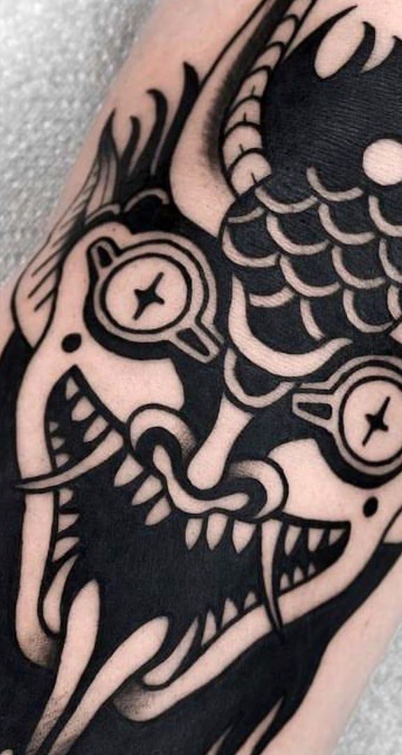 a black and white cover-up tattoo design on the forearm, berlin, germany