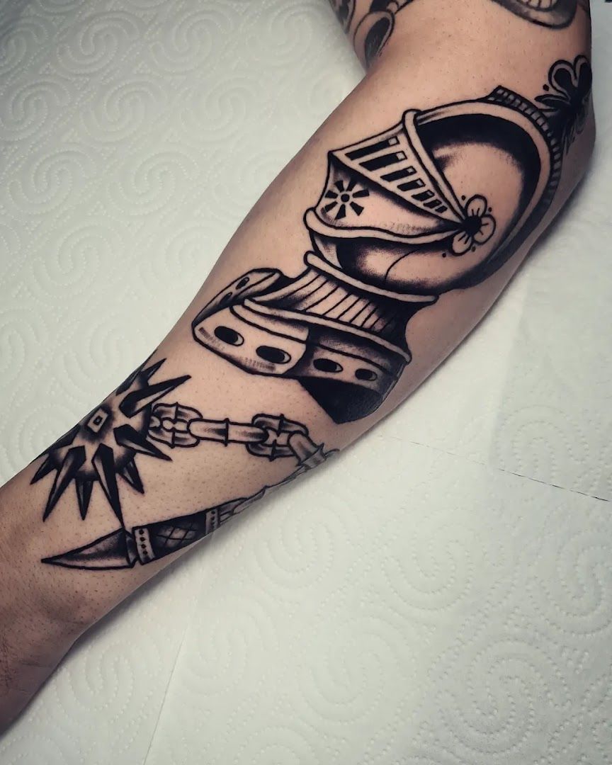 a black and white narben tattoo of a knight with a sword, berlin, germany