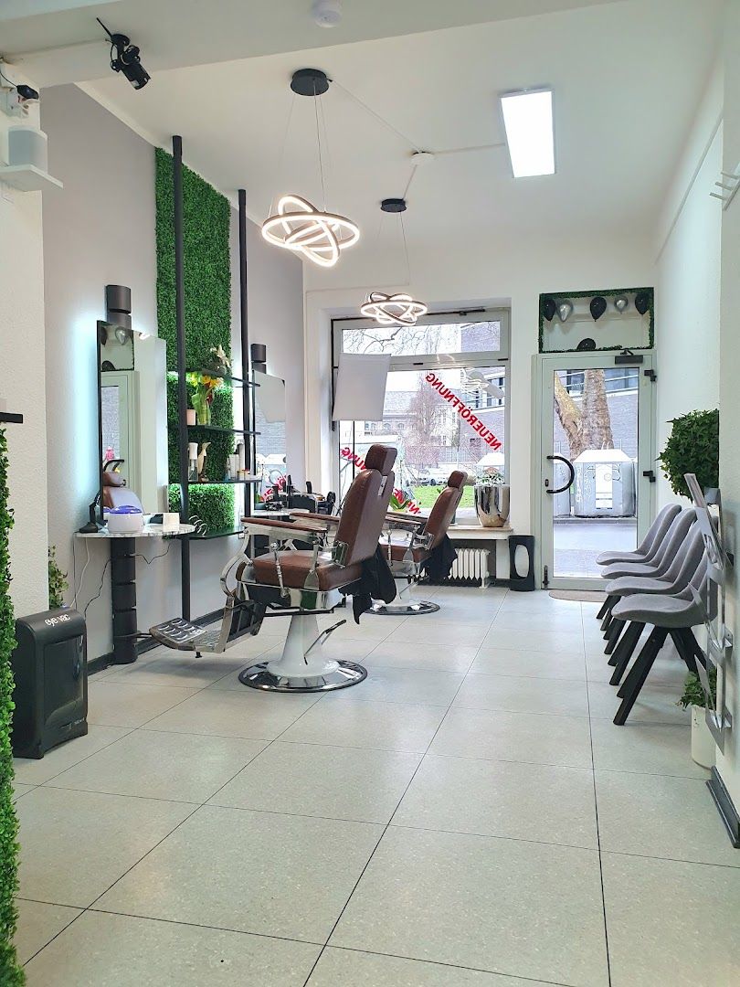 a salon with a large mirror and chairs