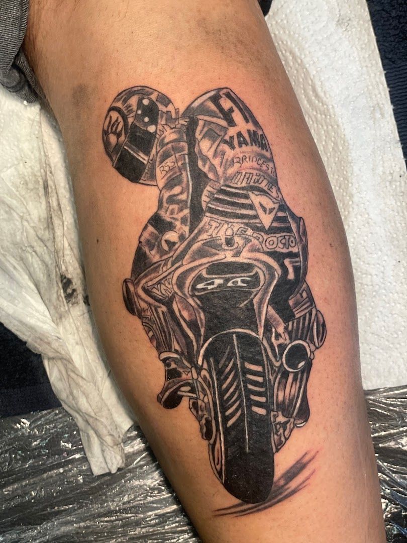 a black and white cover-up tattoo of a motorcycle, altenkirchen, germany