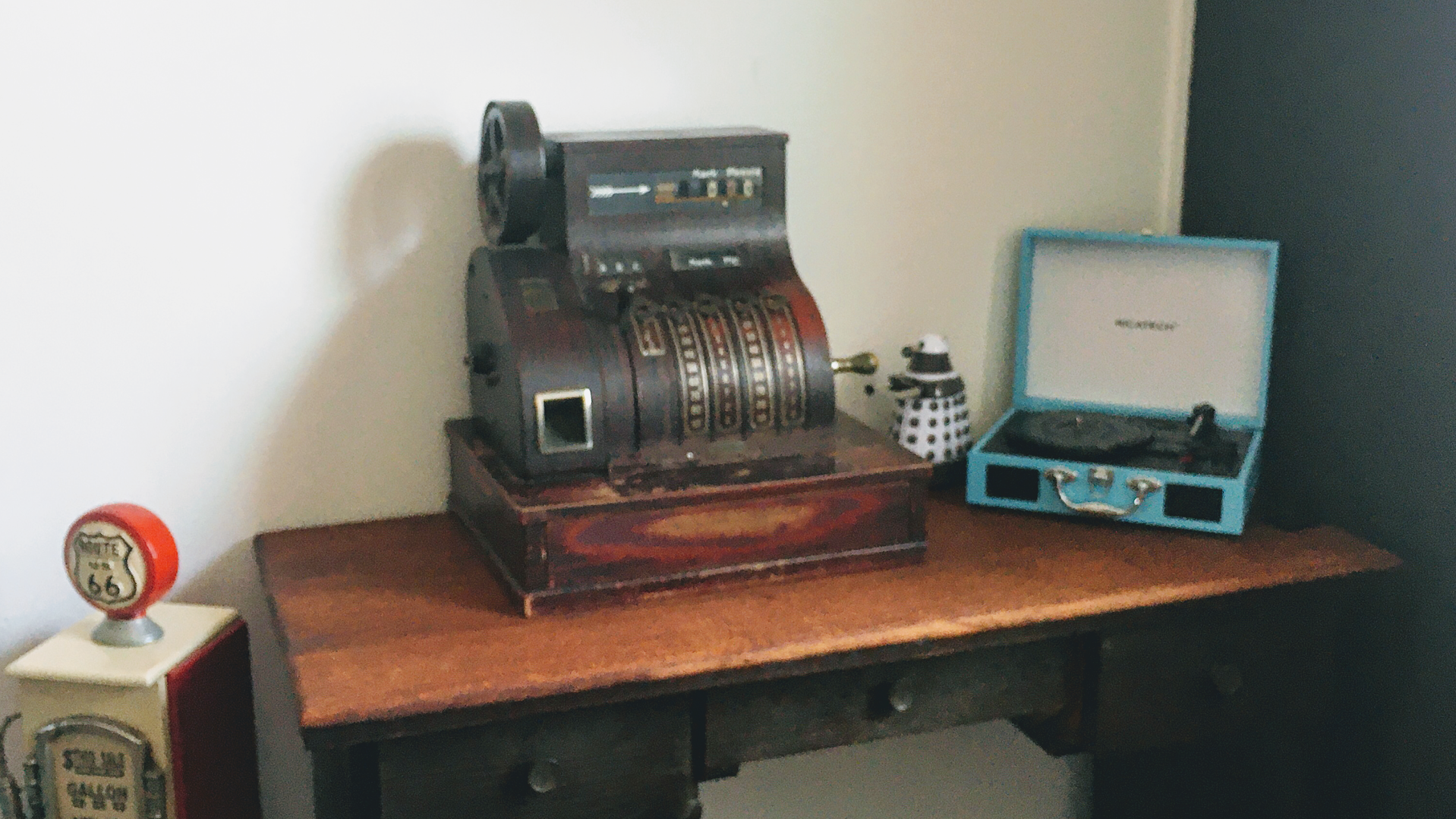 a small table with a small clock and a small clock