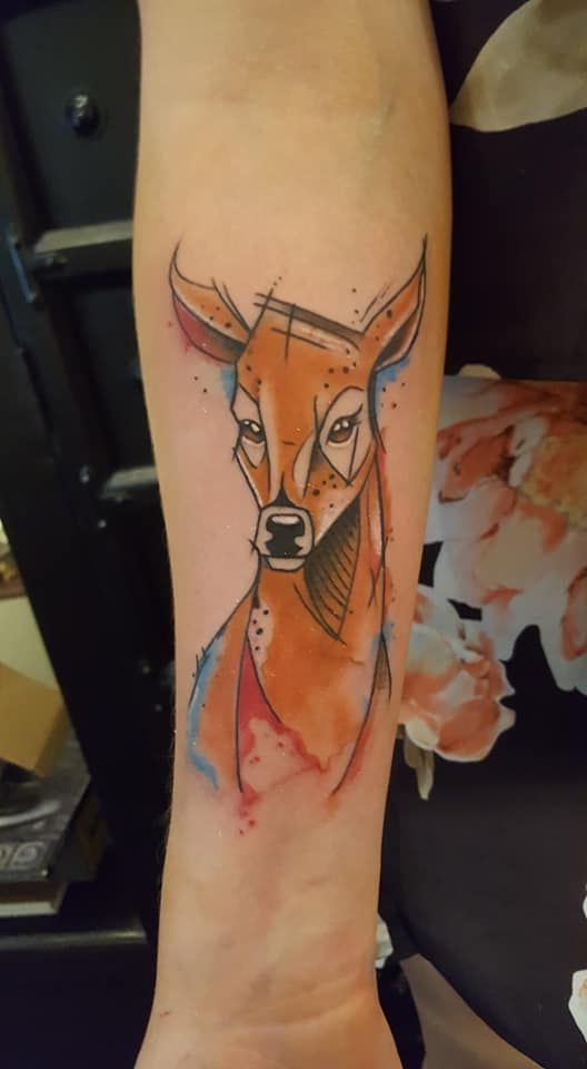 a cover-up tattoo of a deer with a watercolor effect, mönchengladbach, germany