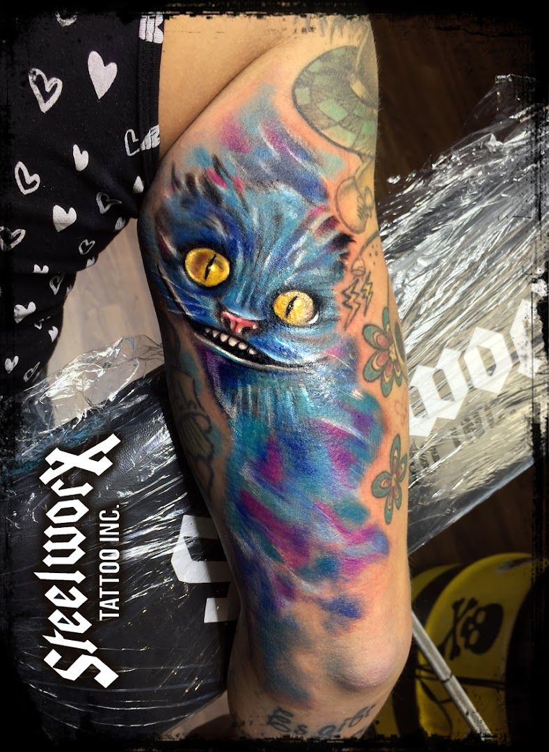 a cover-up tattoo with a cat on it, schweinfurt, germany