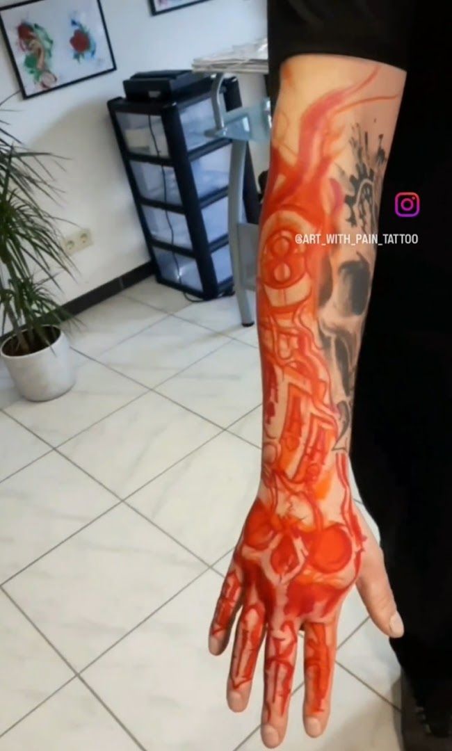 a man with a cover-up tattoo on his arm, alzey-worms, germany