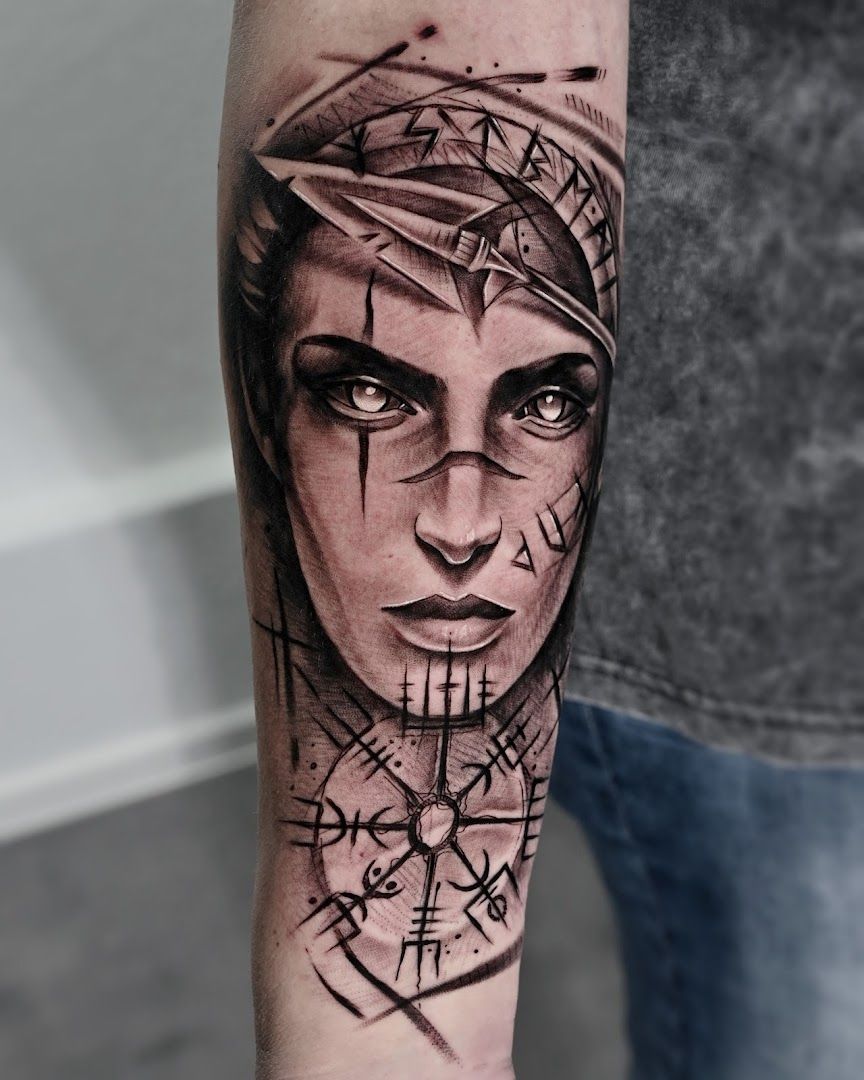 a cover-up tattoo of a woman with a hat and a compass, lörrach, germany