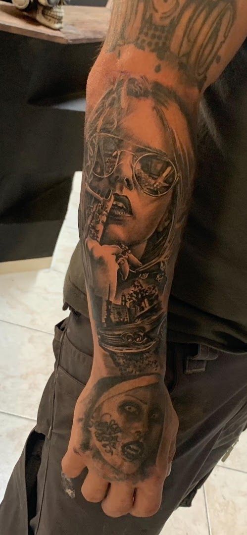 a man with a japanische tattoos in leipzig on his arm, forchheim, germany