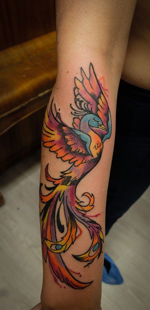 a narben tattoo with a bird on it, dresden, germany