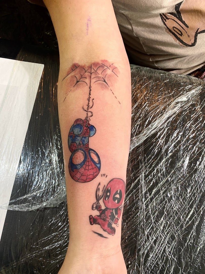 spider and spider cover-up tattoo, bernkastel-wittlich, germany
