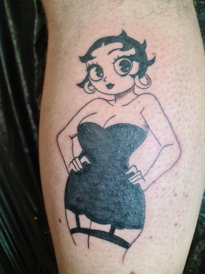 a narben tattoo of a woman in a black dress, wittmund, germany