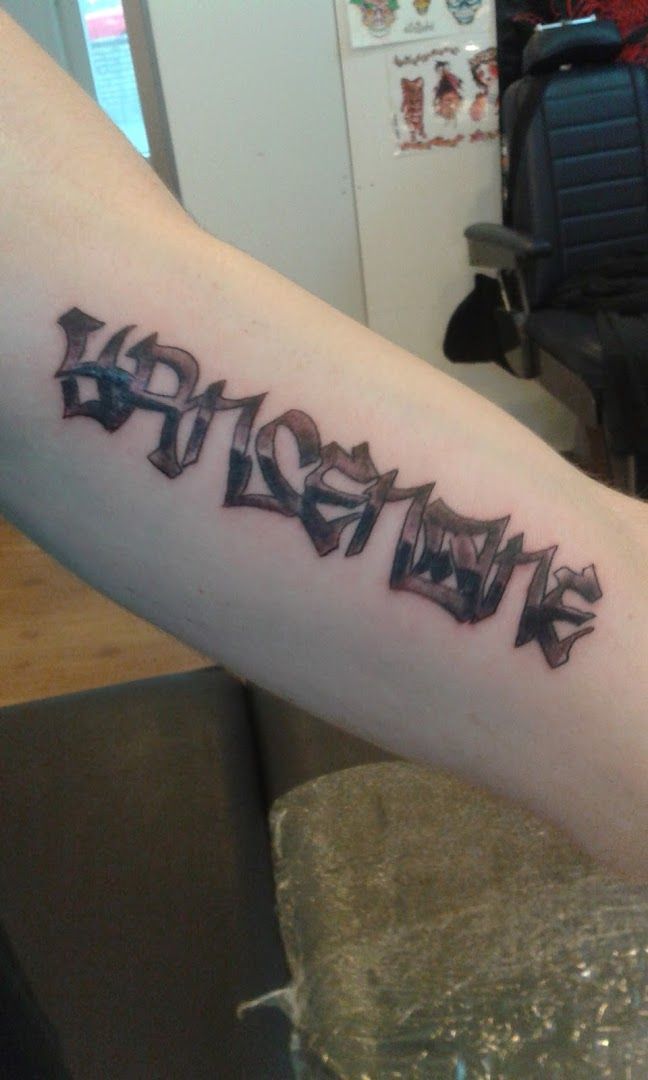 a narben tattoo with the word's name on it, stormarn, germany