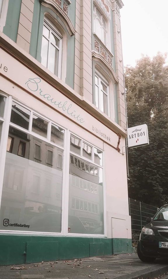 a car parked in front of a building