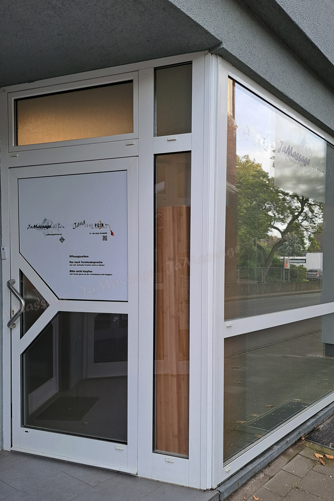 a white door with a sign on it