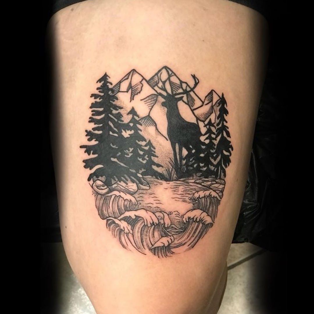 a narben tattoo of a mountain scene with trees and a river, schleswig-flensburg, germany