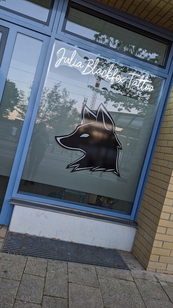 a dog is seen in the window of a dog shop